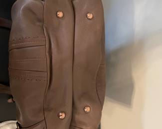 K5 - $45. B Makowsky brown leather shoulder bag with gold tone hardware. Exceptionally Soft heavy leather with expandable bottom. Never used. Includes dust bag. Measures 13”w x 12”t. Mostly stays collapsed but expands to 4.5” to accommodate anything you need to carry.