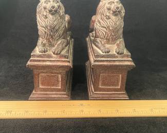 K43 - $45. Cast metal/bronze Lion bookends Measures each 6”w x 2.5”d x 6”t .