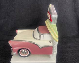 K39 - $15. Single Drive-In bookend. Some crazing. Measures 6”w x 6”d x 7.25”t.