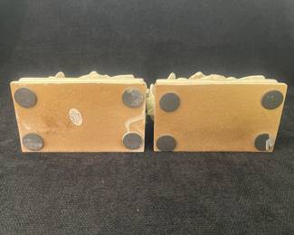 K42 - $20. Vintage White CBK magnolia bookends. Measures 3”w x 5”d x 5.75”t.