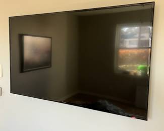 B13 - $50. Samsung 50" TV. UN50HU6950F. Mfg. Oct. 14. Wall mount not included but we have the base.