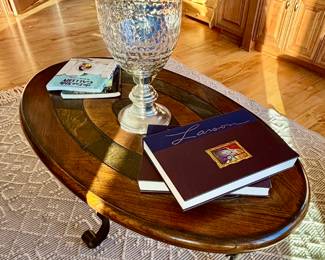 Oval coffee table metal base with detailed tile/ceramic top