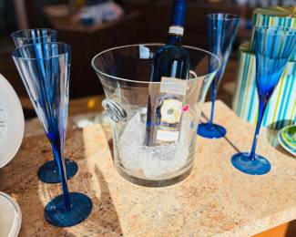 Ice bucket and cobalt flute glasses