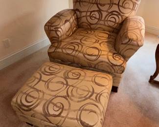 Pair of matching occasional chairs with matching ottomans