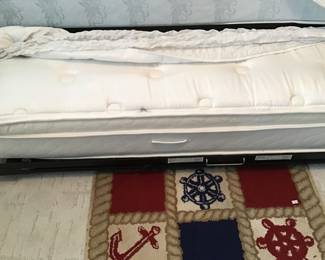 Very clean mattresses on trundle bed