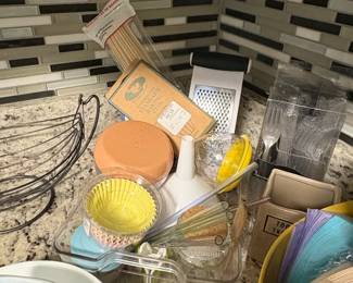 Assorted Kitchenware and Baking Supplies including Bamboo Organizer, Coffee Maker, Cast Iron Skillet, Le Creuset Pot, and Muffin Tins second image