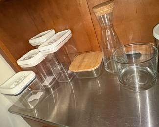 Assorted Kitchen Canisters, Carafe, and Drinking Glass Set