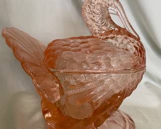 A vintage L.E. Smith pink glass turkey covered candy dish.