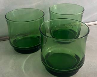 Vintage Mid-Century Modern green glass tumblers, likely the Libbey "Impromptu" style, also referred to as lowball or rocks glasses. 