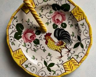 This is a Ucagco Early Provincial "Rooster & Roses" lemon dish or handled nappy. 
