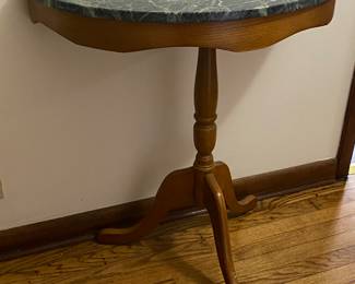 Demilune table with green marble top