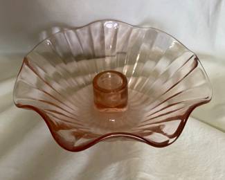 A vintage pink depression glass ruffled candlestick holder, 1930s 
