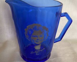 A vintage 1930s Hazel-Atlas Shirley Temple cobalt blue depression glass creamer pitcher