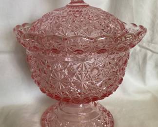 A vintage L.G. Wright pink selenium glass compote, or covered candy dish, in the "Daisy and Button" pattern. 