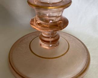 A single Tiffin Art Deco Glass Candlestick Holder in pink with gold-gilded rim and a floral swag pattern