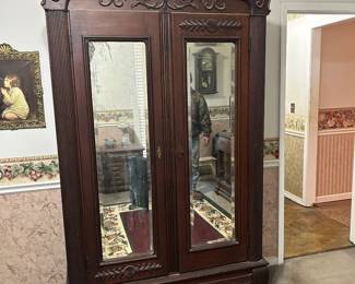 Antique Rococo Style carved wooden Armoire. Located in house 