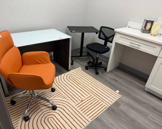 Items are individually priced. Reasonable offers welcome.   All items brand new! Orange Rolling Chair - $80, Desk - $100, Rug - $20, Rolling table  - $40, Rolling desk chair - $25, 3D printed accent lamp - $12