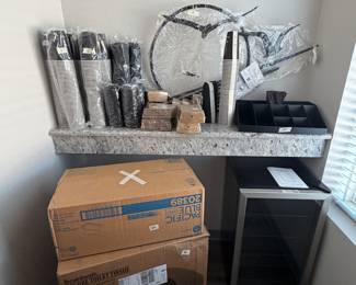 Items are individually priced. Reasonable offers welcome. Fridge - $140, Coffee cut sleeve - $5, Coffee cup topper per sleeve - $3, Coffee cup jacket per sleeve - $3, Art Work - $8, Box of commercial toilet paper - $15, Box of commercial paper towels for dispensers - $20, Box of Commercial Toilet paper regular size - $20