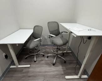 Items are individually priced. Reasonable offers welcome.   All items brand new! Rolling Chairs - $25 each, Adjustable height desks - $250 each 