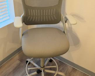 Grey swivel rolling chair with raising and lowering capabilities  with leg rest (multiple in stock)
