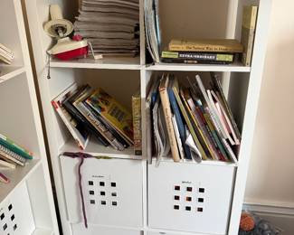 Cabinets with storage, storage filled with yarn