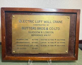 Brass manufacturers plate from electric luff wall crane built by Butters Bros. Co.