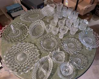 Fostoria collection- 18 water goblets 16 saucers 16 cups 19 small bread plates 1 candy dish with lid 20 dinner plates 2 salt shakers, 2 pepper shakers 2 serving platters 3 sugar bowls 5 creamers 1 divided veg/relish serving dish 1 small candy dish with hook handle 1 keyhole platter 1 toothpick holder 1 oval serving dish 10 small plates 5 dessert dishes 8 juice glasses 7 small fruit dishes 1 handled serving dish 2 candelabras holds three candles 1 cake server 1 round serving dish 1 butter dish with cover 1 small serving dish with like for jam 2 small oval serving dishes 2 flat butter dishes no co