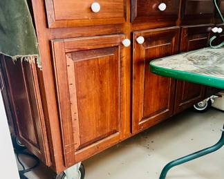 This is one of the coolest things... it's a storage cabinet on wheels with a tile counter and stove top! And only $200 at half off! 