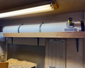 Refracting telescope with 8" mirror