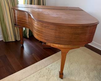 #5 - $1,250 - Wurlitzer Piano with bench 54wx54dx38t price 
