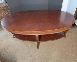 	Oval Wood Coffee Table With Shelf