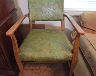 	Green Vinyl Covered Chair With Wood Arms