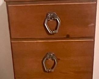 Lingerie cabinet filled with women's bras and slips