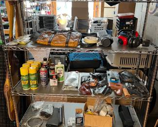 Firearm holsters, firearm cleaning supplies, camping gear.