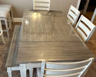 Dinning room set. Covered with removable protective plastic 