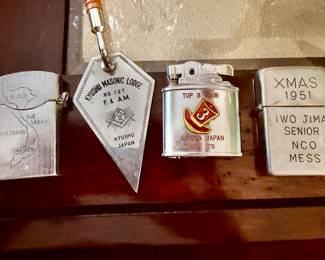 Vietnam and WWII lighters. 