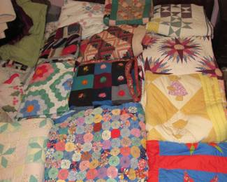 Lots of hand sewn quilts