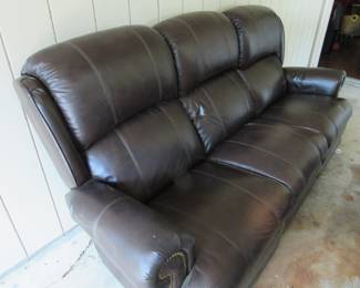 LaZboy sofa moved onto carport to make room for all the glass.