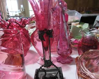 Beautiful fluted cranberry vase set in pewter stand