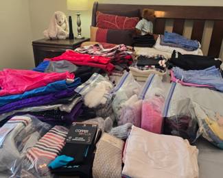 This is the first door on the right when you go upstairs. The bed is currently home to shorts, skorts, and also pajamas.