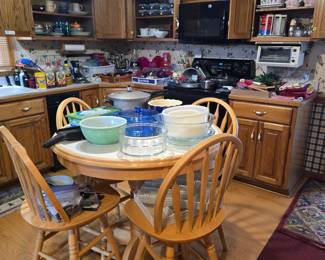 White tiled pub table in the kitchen.