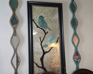 Wall decor above the king-sized bed.