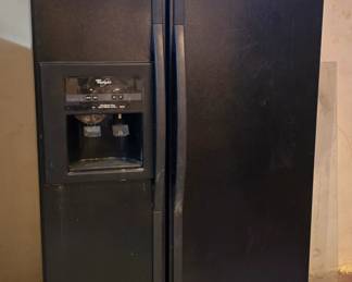 Whirlpool refrigerator.  Not too sure about the ice maker, but it will freeze and cool whatever you can fit in there!