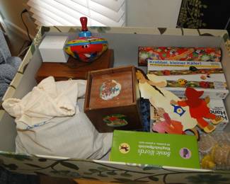 However this box holds, vintage toys and cutouts