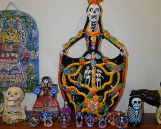 A very fine collection of Dia De Los Muertos decorative items
