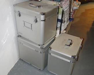 Three silver storage containers
