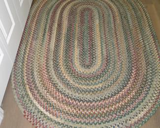Braided area rug, nice and thick, and of a nice neutral color too