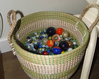MARBLES!!!  Yes, the entire basket is filled with marbles, and this is one of two that we have