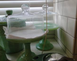 We have a pair of these remarkable domed cake or cookie, or pastry, or egg holders