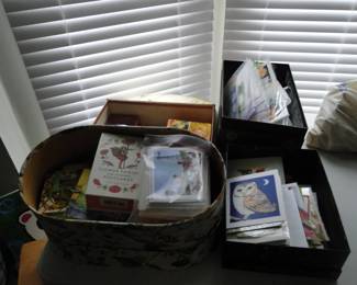 Storage boxes filled with card supplies